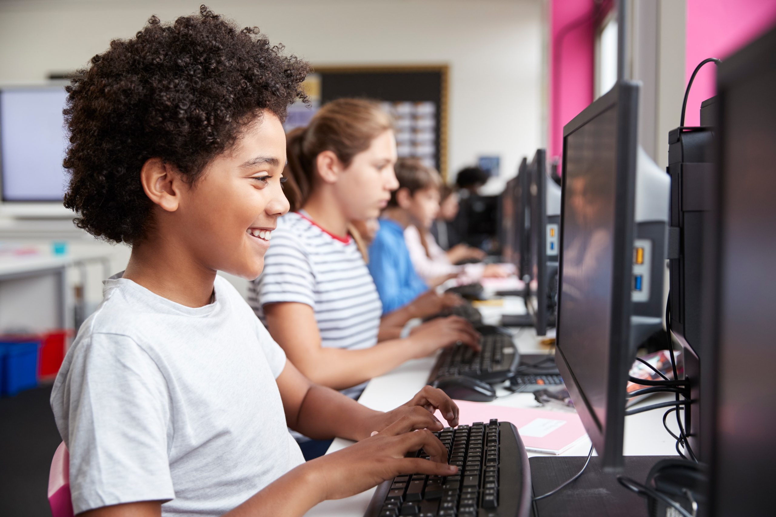 Kids working on their computers in a classroom